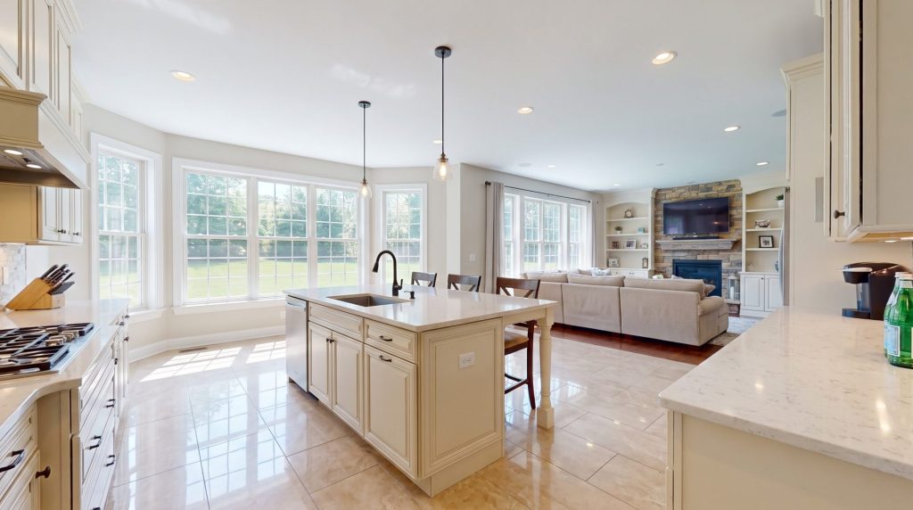 Bright open-concept kitchen and living room in a spotless suburban New Jersey home